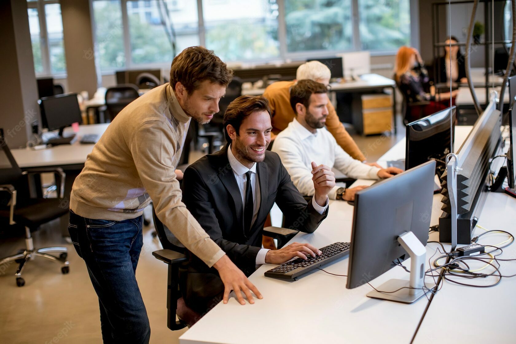 Group of people collaborating in an office setting